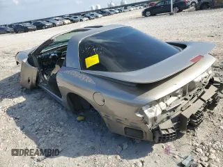 1999 Pontiac Firebird Formula with VIN 2G2FV22G2X2233618, listed as a Copart auction lot 82895584 with 0 mi miles and Salvage Title. Bid and sale history available at carsss.com. Image 2.