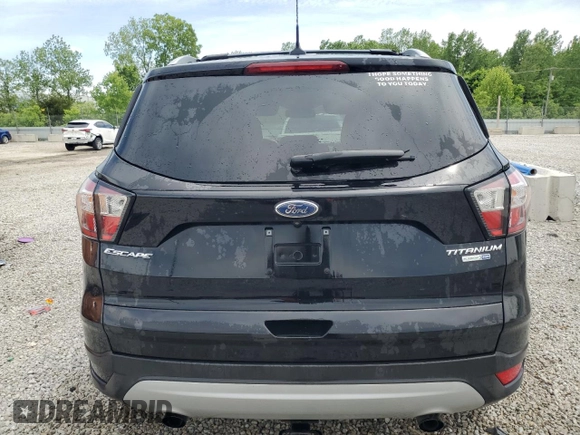 2018 Ford Escape Titanium with VIN 1FMCU9J93JUB80907, listed as a Copart auction lot 55932275 with 102,295 mi miles and Salvage title. Bid and sale history available at DreamBid. Image 6.