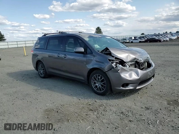 2011 Toyota Sienna XLE with VIN 5TDDK3DC2BS028058, listed as a Copart auction lot 54374215 with 216,905 mi miles and Salvage Title. Bid and sale history available at DreamBid. Image 14.