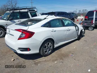 2016 Honda Civic Sedan LX with VIN 19XFC2F54GE018440, listed as a IAAI auction lot 41842654 with 99,315 mi miles. Bid and sale history available at carsss.com. Image 4.