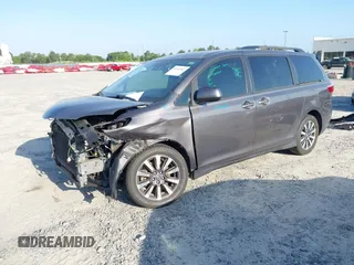 2018 Toyota Sienna LE with VIN 5TDJZ3DC3JS190746, listed as a IAAI auction lot 42161562 with 180,000 mi miles and . Bid and sale history available at DreamBid. Image 2.