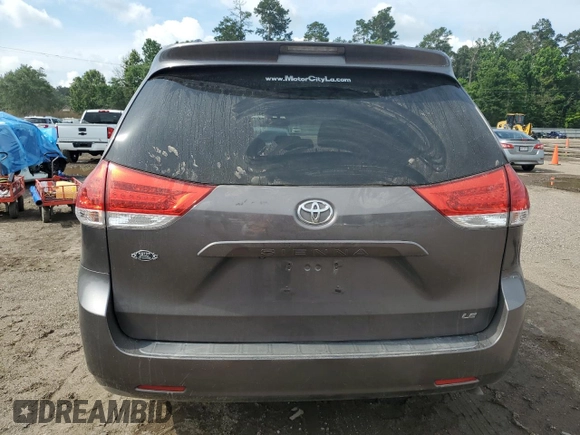 2014 Toyota Sienna LE AAS with VIN 5TDKK3DCXES491979, listed as a Copart auction lot 58493005 with 165,975 mi miles and Salvage title. Bid and sale history available at DreamBid. Image 6.