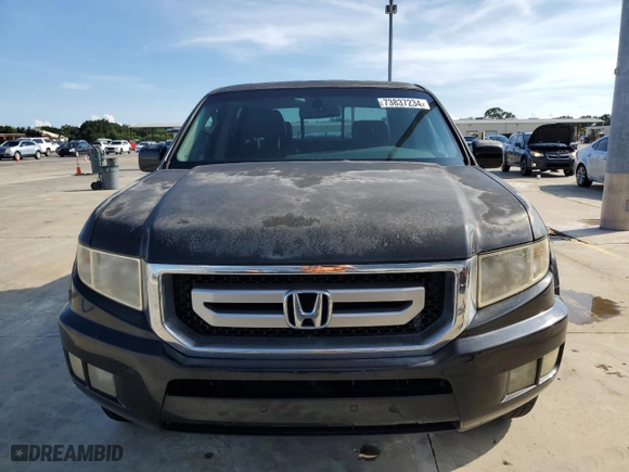 2011 Honda Ridgeline RTL with VIN 5FPYK1F56BB006435, listed as a Copart auction lot 73837234 with 99,034 mi miles and Salvage Title. Bid and sale history available at carsss.com. Image 5.