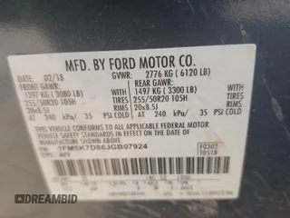 2018 Ford Explorer XLT z VIN 1FM5K7D86JGB07924, wystawiony jako Copart lot #56415575 z przebiegiem 151 540 mil mil oraz Szkody całkowita. Historia ofert i sprzedaży dostępna na DreamBid. Obrazek 13.