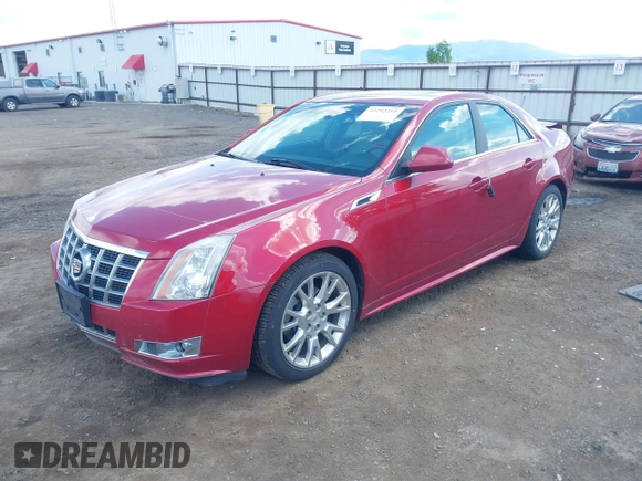 2012 Cadillac CTS Premium z VIN 1G6DS5E31C0104841, wystawiony jako IAAI lot #42292295 z przebiegiem 124 477 mil mil oraz . Historia ofert i sprzedaży dostępna na DreamBid. Obrazek 2.