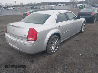 2009 Chrysler 300 with VIN 2C3LA63T89H622085, listed as a IAAI auction lot 41872519 with 151,543 mi miles. Bid and sale history available at carsss.com. Image 4.