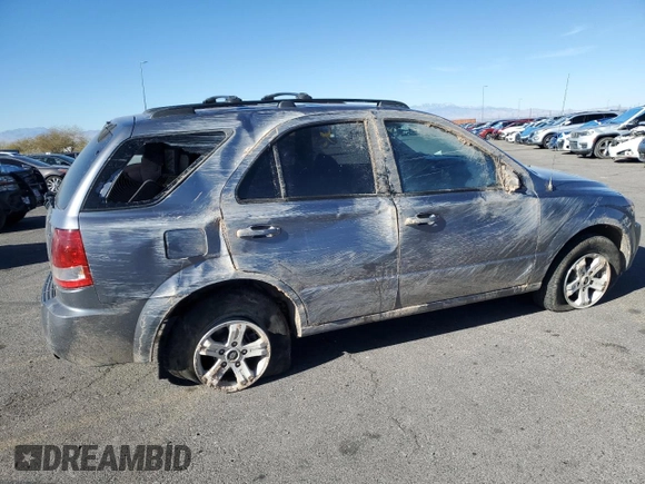 2005 Kia Sorento LX with VIN KNDJD733X55410306, listed as a Copart auction lot 45815005 with 104,153 mi miles and Salvage Title. Bid and sale history available at DreamBid. Image 3.