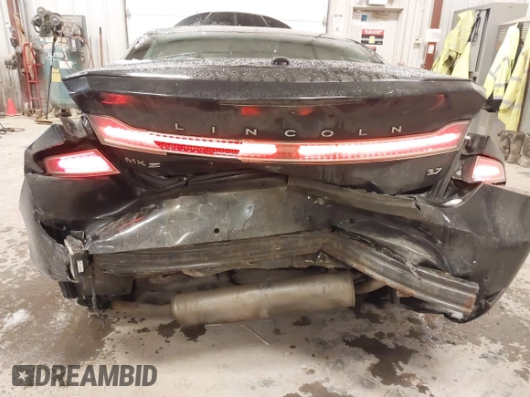 2013 Lincoln MKZ с VIN 3LN6L2GK1DR817922, выставлен на аукционе IAAI как лот 41315599 с пробегом 89 463 миль миль и . История ставок и продаж доступна на DreamBid. Изображение 6.