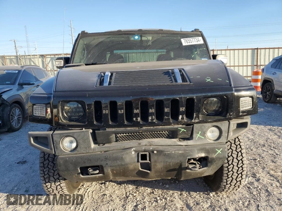 2005 Hummer H2 SUT z VIN 5GRGN22U85H109003, wystawiony jako Copart lot #76557734 z przebiegiem 115 249 mil mil oraz Szkoda całkowita • Salvage title. Historia ofert i sprzedaży dostępna na DreamBid. Obrazek 5.