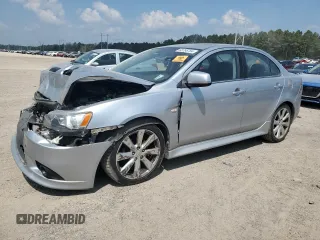 2014 Mitsubishi Lancer Ralliart with VIN JA32V6FV5EU000994, listed as a Copart auction lot 68766704 with 89,276 mi miles and Salvage Title. Bid and sale history available at DreamBid. Image 1.