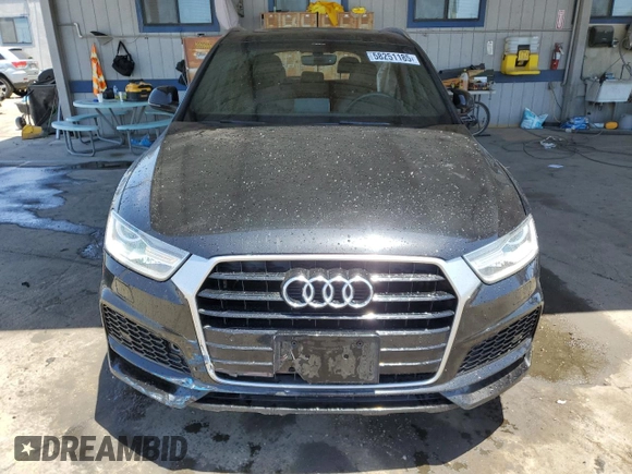 2018 Audi Q3 Premium with VIN WA1BCCFS9JR033287, listed as a Copart auction lot 58251185 with 157,839 mi miles and Salvage title. Bid and sale history available at DreamBid. Image 5.