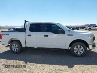 2018 Ford F-150 XL with VIN 1FTEW1E54JKF30802, listed as a IAAI auction lot 42417270 with 67,956 mi miles and . Bid and sale history available at DreamBid. Image 13.