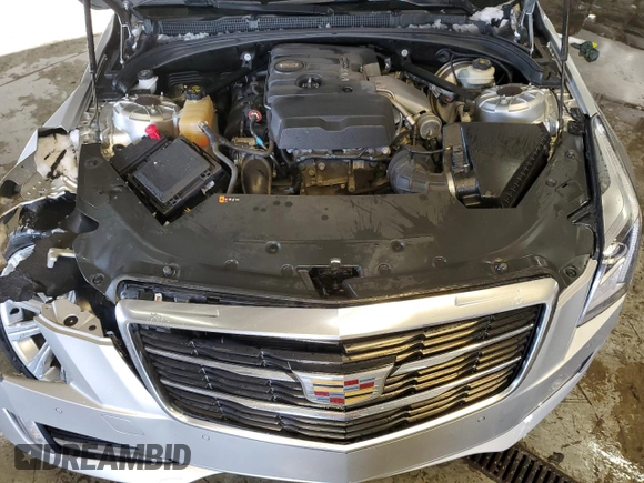 2015 Cadillac ATS Luxury AWD z VIN 1G6AH1RX4F0113934, wystawiony jako Copart lot #84439094 z przebiegiem 56 679 mil mil oraz Szkoda całkowita • Salvage title. Historia ofert i sprzedaży dostępna na DreamBid. Obrazek 11.