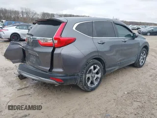 2019 Honda CR-V EX with VIN 2HKRW1H51KH516045, listed as a IAAI auction lot 41834293 with 113,438 mi miles. Bid and sale history available at carsss.com. Image 4.