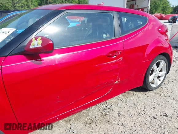 2013 Hyundai Veloster w/Gray Int with VIN KMHTC6AD8DU112810, listed as a IAAI auction lot 42144625 with 142,524 mi miles and . Bid and sale history available at DreamBid. Image 17.