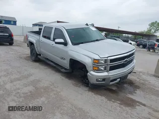 2015 Chevrolet Silverado 1500 LT with VIN 3GCUKREC8FG490856, listed as a IAAI auction lot 42067589 with 121,120 mi miles. Bid and sale history available at carsss.com. Image 1.
