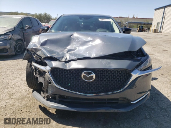 2021 Mazda 6 Grand Touring Reserve with VIN JM1GL1WY4M1617118, listed as a Copart auction lot 54951114 with 14,670 mi miles and Salvage Title. Bid and sale history available at DreamBid. Image 5.