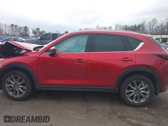 2020 Mazda CX-5 Grand Touring with VIN JM3KFADMXL0842026, listed as a IAAI auction lot 41477339 with 60,755 mi miles. Bid and sale history available at carsss.com. Image 14.