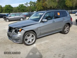 2015 Mercedes-Benz GLK with VIN WDCGG8JBXFG396957, listed as a Copart auction lot 50127535 with 58,227 mi miles and Salvage Title. Bid and sale history available at carsss.com. Image 1.