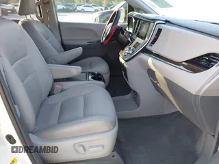 2015 Toyota Sienna XLE with VIN 5TDYK3DC5FS534913, listed as a IAAI auction lot 42052427 with 105,046 mi miles. Bid and sale history available at carsss.com. Image 5.