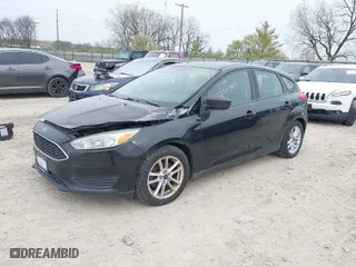 2015 Ford Focus SE with VIN 1FADP3K22FL293099, listed as a IAAI auction lot 42032905 with 203,699 mi miles. Bid and sale history available at carsss.com. Image 2.