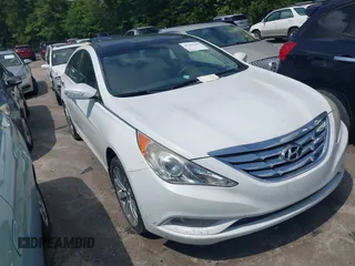 2012 Hyundai Sonata Limited z VIN 5NPEC4AB7CH385438, wystawiony jako IAAI lot #42351689 z przebiegiem 138 610 mil mil oraz . Historia ofert i sprzedaży dostępna na DreamBid. Obrazek 1.