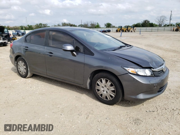 2012 Honda Civic LX с VIN 2HGFB2F54CH595617, выставлен на аукционе Copart как лот 50902745 с пробегом 209 347 миль миль и Списание • Salvage title. История ставок и продаж доступна на DreamBid. Изображение 4.