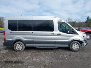 2017 Ford Transit Passenger XL z VIN 1FBAX2CG0HKA88590, wystawiony jako IAAI lot #41955797 z przebiegiem 135 287 mil mil oraz . Historia ofert i sprzedaży dostępna na DreamBid. Obrazek 13.