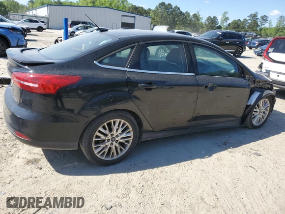 2017 Ford Focus Titanium with VIN 1FADP3J21HL260065, listed as a Copart auction lot 53165945 with 110,540 mi miles and Salvage title. Bid and sale history available at DreamBid. Image 3.