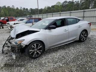 2018 Nissan Maxima Platinum z VIN 1N4AA6AP8JC369808, wystawiony jako Copart lot #51486085 z przebiegiem Nie podano mil oraz Szkoda całkowita • Salvage title. Historia ofert i sprzedaży dostępna na DreamBid. Obrazek 1.