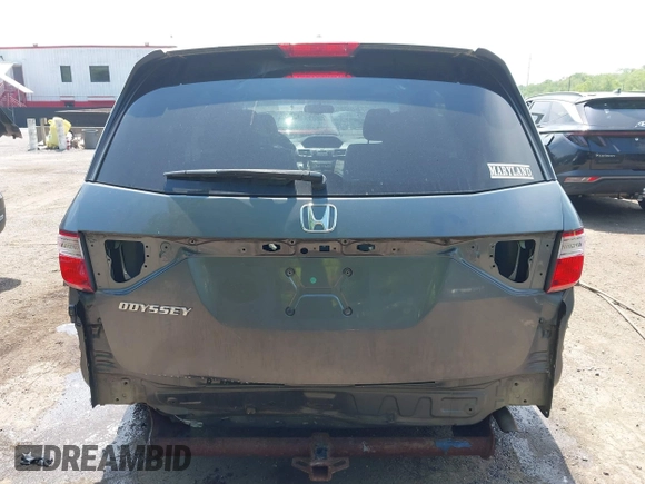 2012 Honda Odyssey EX-L with VIN 5FNRL5H67CB041252, listed as a IAAI auction lot 42158494 with 152,940 mi miles and . Bid and sale history available at DreamBid. Image 17.