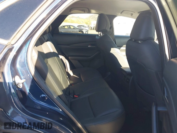 2023 Mazda CX-30 S Select with VIN 3MVDMBBM8PM514475, listed as a IAAI auction lot 41664456 with 33,076 mi miles and . Bid and sale history available at DreamBid. Image 8.