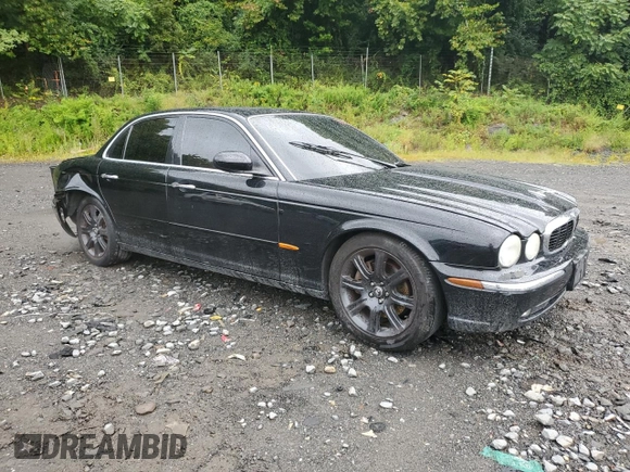 2004 Jaguar XJ with VIN SAJWA71C24SG33915, listed as a Copart auction lot 69626864 with 123,746 mi miles and Non Repairable. Bid and sale history available at carsss.com. Image 4.