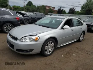 2014 Chevrolet Impala LTZ with VIN 2G1WC5E31E1184046, listed as a Copart auction lot 62561395 with 207,989 mi miles and Clean title. Bid and sale history available at DreamBid. Image 1.