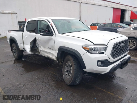 2021 Toyota Tacoma 4WD SR5 with VIN 3TMDZ5BN6MM108851, listed as a IAAI auction lot 41513057 with 25,261 mi miles. Bid and sale history available at carsss.com. Image 1.