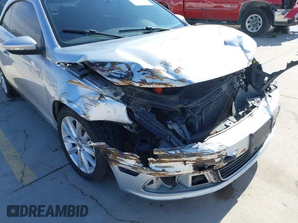 2012 Volkswagen Eos Komfort with VIN WVWBW7AH5CV005738, listed as a IAAI auction lot 41619744 with 131,340 mi miles and . Bid and sale history available at DreamBid. Image 18.