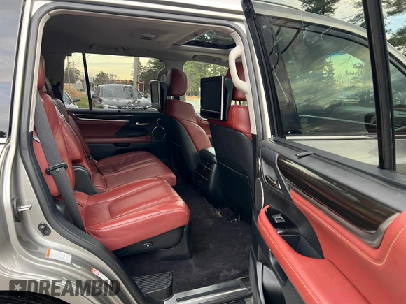 2016 Lexus LX 570 with VIN JTJHY7AX7G4203810, listed as a Copart auction lot 86017494 with 296,703 mi miles and Clean Title. Bid and sale history available at DreamBid. Image 6.
