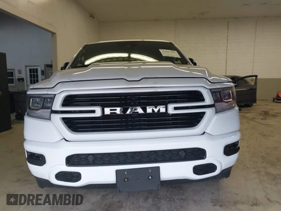 2021 Ram 1500 Laramie with VIN 1C6SRFJT6MN671456, listed as a IAAI auction lot 41087757 with 40,593 mi miles and . Bid and sale history available at DreamBid. Image 12.