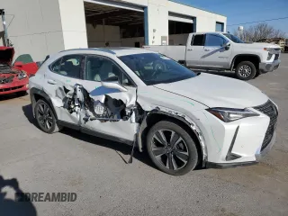 2022 Lexus UX with VIN JTHX3JBH1N2051189, listed as a Copart auction lot 49733245 with 33,265 mi miles and Salvage Title. Bid and sale history available at carsss.com. Image 4.