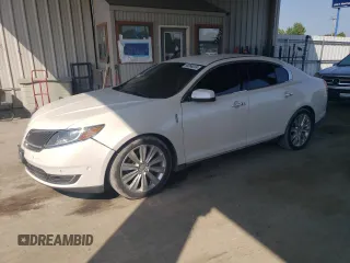 2014 Lincoln MKS EcoBoost z VIN 1LNHL9FTXEG600454, wystawiony jako Copart lot #69066204 z przebiegiem 148 279 mil mil oraz Nie do naprawy • Non repairable. Historia ofert i sprzedaży dostępna na DreamBid. Obrazek 1.