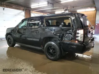 2013 Chevrolet Suburban LT with VIN 1GNSKJE73DR111018, listed as a Copart auction lot 48622865 with 256,055 mi miles and Salvage Title. Bid and sale history available at carsss.com. Image 2.