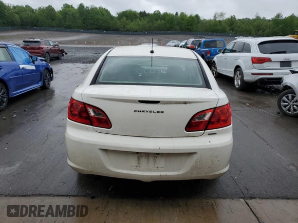 2010 Chrysler Sebring Limited z VIN 1C3CC5FV8AN110632, wystawiony jako Copart lot #57552935 z przebiegiem 208 241 mil mil oraz Szkody całkowita. Historia ofert i sprzedaży dostępna na DreamBid. Obrazek 6.