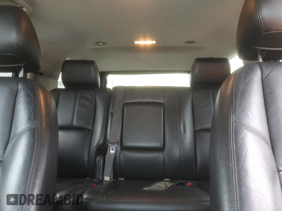 2012 GMC Yukon SLT with VIN 1GKS2CE09CR122728, listed as a Copart auction lot 87093604 with 124,739 mi miles and Salvage Title. Bid and sale history available at carsss.com. Image 10.