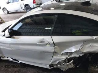 2015 BMW M4 z VIN WBS3R9C59FK331843, wystawiony jako IAAI lot #42105398 z przebiegiem 105 348 mil mil oraz . Historia ofert i sprzedaży dostępna na DreamBid. Obrazek 14.