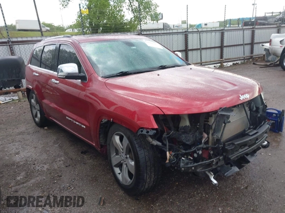 2014 Jeep Grand Cherokee Overland with VIN 1C4RJFCG9EC460165, listed as a IAAI auction lot 42092137 with 131,802 mi miles and . Bid and sale history available at DreamBid. Image 1.