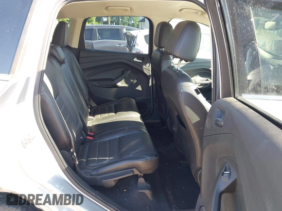 2016 Ford Escape Titanium with VIN 1FMCU9J97GUB91966, listed as a IAAI auction lot 42378829 with 121,218 mi miles and . Bid and sale history available at DreamBid. Image 8.