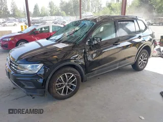 2021 Volkswagen Tiguan S with VIN 3VV0B7AX1MM098300, listed as a IAAI auction lot 42574636 with 53,559 mi miles and . Bid and sale history available at DreamBid. Image 17.