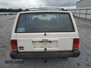 1996 Jeep Cherokee Sport z VIN 1J4FJ68S3TL103684, wystawiony jako Copart lot #63466265 z przebiegiem 163 715 mil mil oraz Czysty tytuł • Clean title. Historia ofert i sprzedaży dostępna na DreamBid. Obrazek 6.