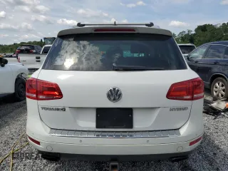 2013 Volkswagen Touareg z VIN WVGEG9BP7DD001849, wystawiony jako Copart lot #60208005 z przebiegiem 120 741 mil mil oraz Czysty tytuł • Clean title. Historia ofert i sprzedaży dostępna na DreamBid. Obrazek 6.