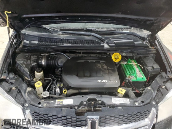 2014 Dodge Grand Caravan SXT with VIN 2C4RDGCG4ER388702, listed as a Copart auction lot 44722665 with 206,299 mi miles and Salvage Title. Bid and sale history available at DreamBid. Image 13.